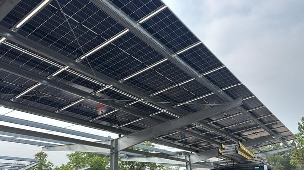 S-5! versabracket and pvkit used to attach solar panels to purlin-based carport structure