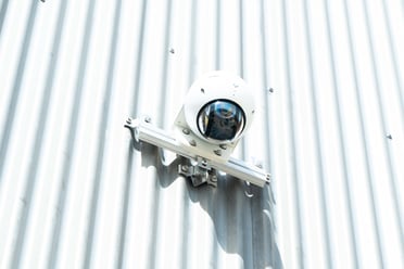 CorruBracket-GRIPPERFIX-Security-Camera-Mounted-Barn-Corrugated-Metal-Roof-1-1