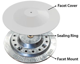 Close-up of a patented flat roof attachment base designed for single-ply membrane roofs, featuring multiple holes for secure mechanical fastening.